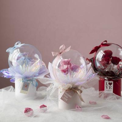 China Light Luxury Eternal Flowers Permanent Flower Bubble Ball Preserved Rose Dried Flower PVC Rose Bouquet Valentine's Day Gift for sale