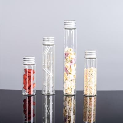 China Transparent food borosilicate glass test tube bottle 6ml 8ml 12ml 20ml with cover for candy food glass jar for sale