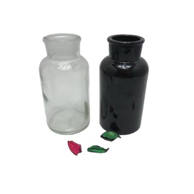 China Personal Care Mini Glass Medicine Bottles with Corks for sale