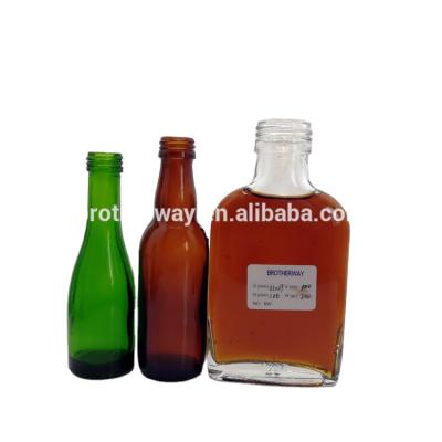 China Recycable Glass Wine Bottle Cylinder 50ml Custom Flat Mini Beer Bottles for sale