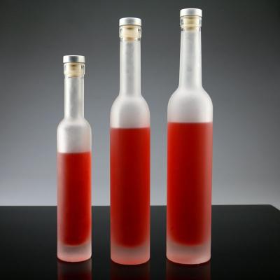 China Hot Sale Empty Frosting Transparent Wine Glass Bottle 375ml 500ml Red Wine Bottle Beverage Bottle With Lid for sale