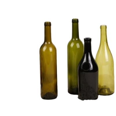 China 1L Beverage Red Wine Glass Bottle With Cork Stopper , Dark Green Glass Liquor Bottle for sale