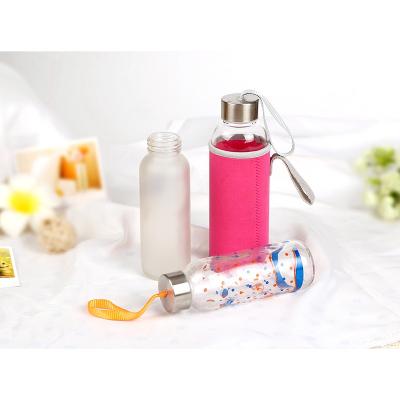 China wholesale custom clear cylindrical EC-compliant 300ml glass water bottle with cover for sale