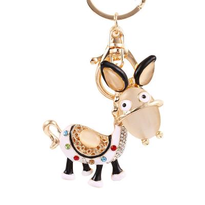 China Doll Bag Car Key Chain Small Donkey Alloy Key Chain Fashionable Creative Machine Small Key Pendant Gift Pendant for sale