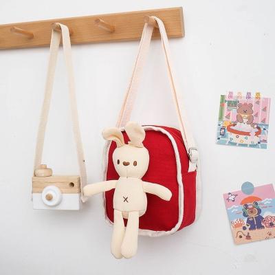 China Central Institute of Statistics Korean version of the bag 2021 fashionable Hao Baby Children Canvas Small new cute messenger One-Shoulder Doll Bunny Children Bag for sale