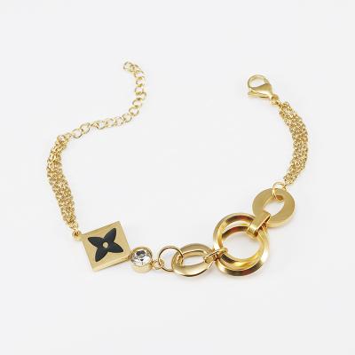 China Gold Plating Punk Unique Zircon 18K Stainless Steel Metal Design Charm Link Chain Bracelet With Multi Elements For Girlfriend for sale