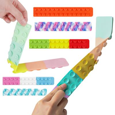 China Squeeze Toy Sucker Toy Multifunctional Relax Stress Decompression Toy Relief Silicone Fidget It Toys for sale