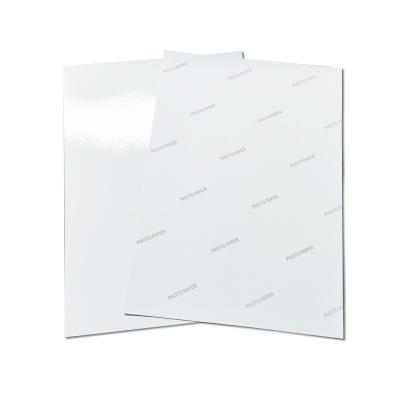 China Cast Coated 115gsm Glossy Sticker Photo Paper for sale