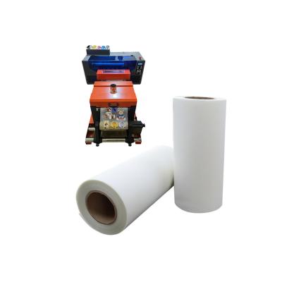 China Textile T - Shirt 30 / 60 / 90cm*100m Transparent DTF Film Roll for sale