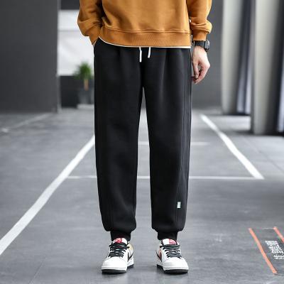 China 2021 Gray Men Jogging Sweatpants Loose Black Autumn Stylish Custom Plus Size Anti-wrinkle Drawstring Long Pants High For Male for sale