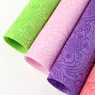 China Anti-bacteria Sunflower Flower Pattern Nonwoven Fabric For Flower Wrapping Flower Embossed Nonwoven Wrapping for sale