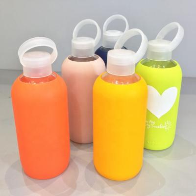 China Viable Hot Selling Product Christmas Promotional Gift Glass Water Bottle With Silicone Cover for sale