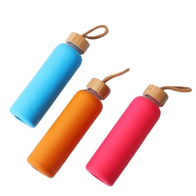 China Good quality sustainable hot sale non-slip portable silicone sleeve glass water bottles wholesale for sale