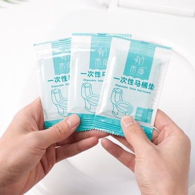 China Portable Travel Individually Wrapped Disposable With Adhesive Mats Toilet Seat Covers Disposable Pe Toilet Film for sale