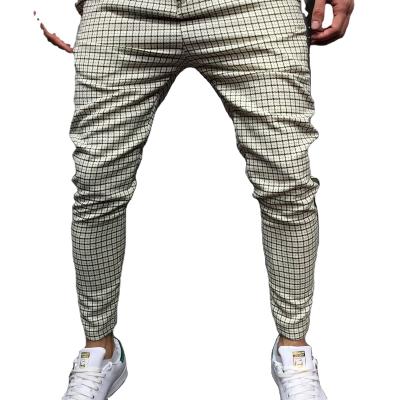 China Anti-Wrinkle Personality Leisure Slim Men Jogging Trousers Plaid Pants Mens Casual Trousers for sale