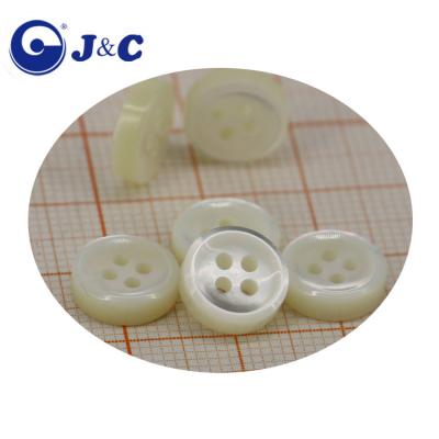 China Dry cleaning 4 holes BROOM white shell buttons, pearly sea shells shirt buttons for sale