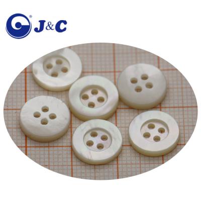 China Dry Cleaning Customize White Button Hole Shape Mother Of Shell Buttons With Wide Rim for sale