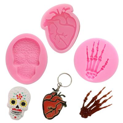 China Viable Diy Halloween Candy Chocolate Molds Mini Heart Shape Skeleton Mold Silicone Halloween Cake Cookie Candle Head Molds for sale