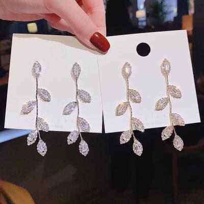 China Other Luxurious Gold Plated Leaf Earrings Delicate Micro Inlay Statement Silver Stud Earrings for sale