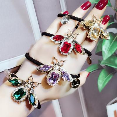 China 2022 Korean Retro Crystal Bee Insect Hair Accessories Personality Design Crystal Ponytail Fixed Women Hair Rope for sale