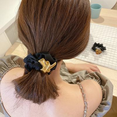 China Hot Selling Luxury Women's Elastic Alloy Ponytail Hair Rope Simple Temperament Hair Bow Tie Band for sale