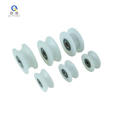 China Building Material Shop 2PCS Bias Nylon Single Runner Wheel Pulley Door Rollers Sliding Doors Shed Booth Accessories for sale