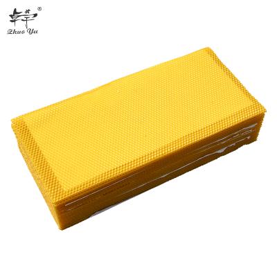 China Bee Frames Bee Sight Beekeeping Tools Grade 100% Pure Pure Yellow Beeswax Comb Core Sheet for sale