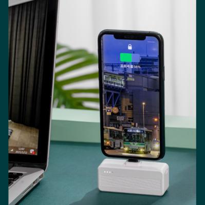 China Wireless Charging Lighting / Type-C Plug In Pocket Power Bank , Mini Power Bank 3000mah With Phone Holder for sale