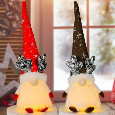 China Christmas Rudolph Faceless Doll Sitting Posture Antler Hat Luminous Doll Christmas Party Decorations Supplies for sale