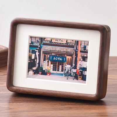 China Modern Home Decor Simplicity Mortise and Tenon Wall Mounted Solid Wood Picture Frame Rounded Corner Swing Table Picture Frame for sale