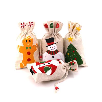 China Folding 2022 New Style Merry Christmas Canvas Gifts Bag Christmas Bags Drawstring With Patterns Candy Bag for sale