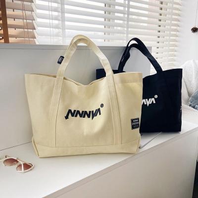 China Eco Cotton Tote Bag Handled Multiple Pockets Zipper Canvas Bag Shopping Bag for sale