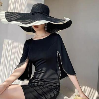 China Black and White Oversized Raffia Straw Straw Summer Brim Ladies Sun Hat Seaside Vacation Sunscreen Sun Hat for sale