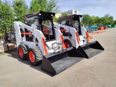 China Mini skid steer loader met palletvork, borstelsnijder, mulcher Te koop