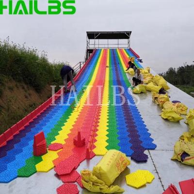 China Exciting Artificial Snow Speed ​​Dry Slide With Skiing Ring Dry Skiing for sale