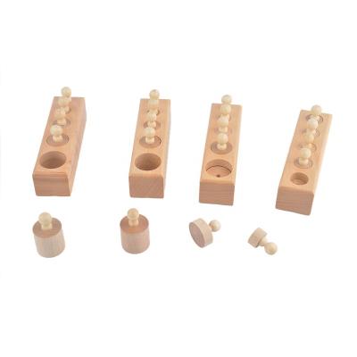 China Eco-Friendly Material Children Wooden Montessori Toys Set Of 4 Mini Knobbed Cylinders Socket Toys for sale