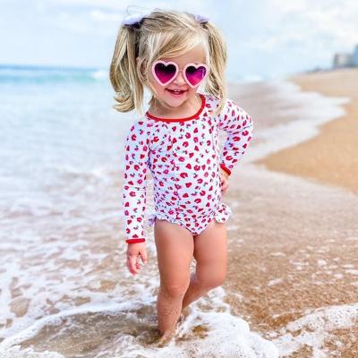 China Pink Print Little Girls Breathable Ruffle One Piece Top Cute Swimsuit Long Sleeves Kids Swimwear for sale