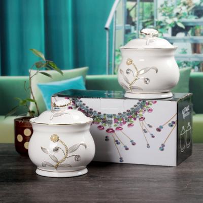 China Freshness Preservation Selling Graceful Pain White Color Porcelain Sunflower Canister Set For Kitchenware for sale