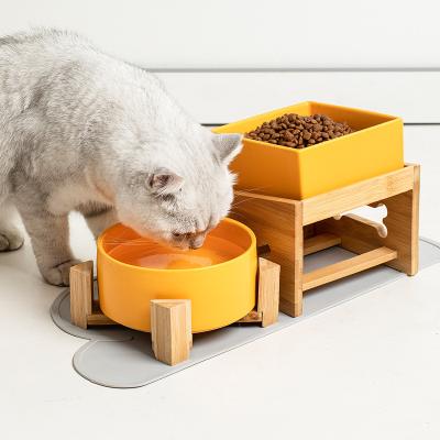 China Sustainable Fashion Custom Matte Round Elevated Ceramic Cat Food Bowl Dog Bowl Pet Bowls With Wooden Stand for sale