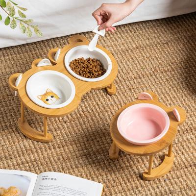 China Beautiful Viable Wholesale High Ceramic Cat Bowl Pet Cat Food Bowl Pet Bowls With Wooden Stand for sale