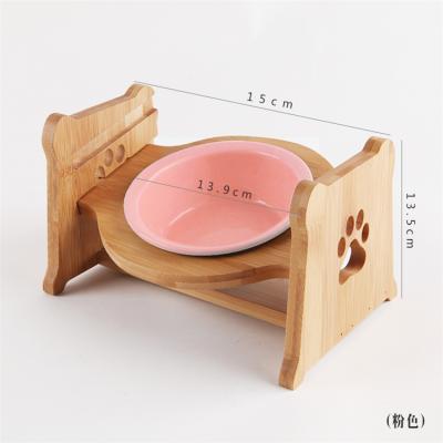 China Fancy Slanted Pink Color Expanded Pet Feeder Viable Feeding Ceramic Cat Bowl For Water Food for sale