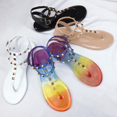 China Summer Lightweight Hot Women's Style Flat Sandals Beach Shoes Women Freeze Sandals With Rivet for sale