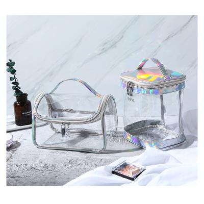 China Fashion Transparent Logo PVC Custom Handheld Designer Makeup Cosmetic Bag For Women for sale