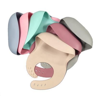 China 2023 Cartoon Amazon silicone bib baby saliva bib cute solid color hot selling stereo waterproof bib new new for sale