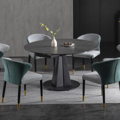 China Nordic stretch rock slab around revolving folding dining table and single retractable household chair combination for sale