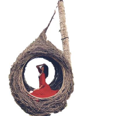 China Modern Outdoor Net Red Bird Rattan Bali Nest Sofa Swing Scenic Spot Shooting Props Hanging Chair Hammock Customization for sale