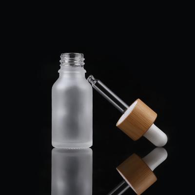 China 30Ml Cosmetic Bamboo Dropper Bottle Essential Oil Frosted Glass Bamboo Bottle for sale