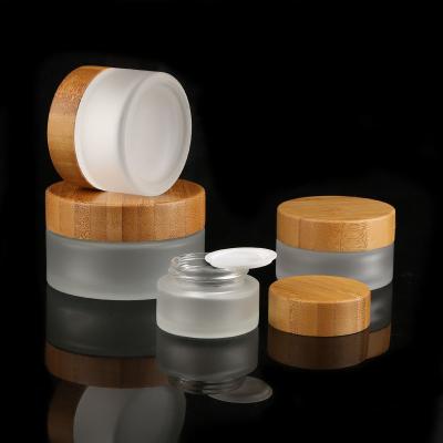 China Wholesale Cosmetic Glass 5g Skin Care Cream Frosted Jar With Bamboo Lid for sale