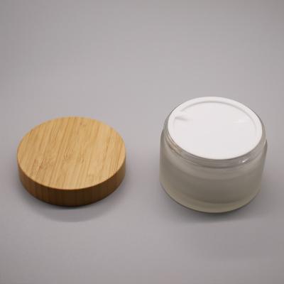 China Wholesale Cosmetic 5g 20g 30g 100g Round Frosted Glass Cosmetic Cream Jar Skin Care Cream Jar With Bamboo Cap for sale