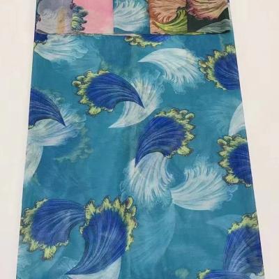 China Breathable In Running Feather Shape Woven Fabric Big Flower Printing Printed Fabric For Women for sale